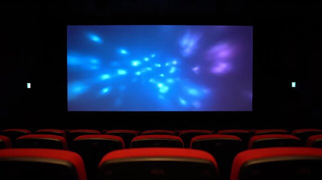 Blank cinema screen and red seats, cinema viewing scene