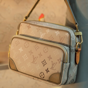 Louis Vuitton Nil bag for men in beige canvas with Monogram pattern. Milan, Italy, 1 August 2026