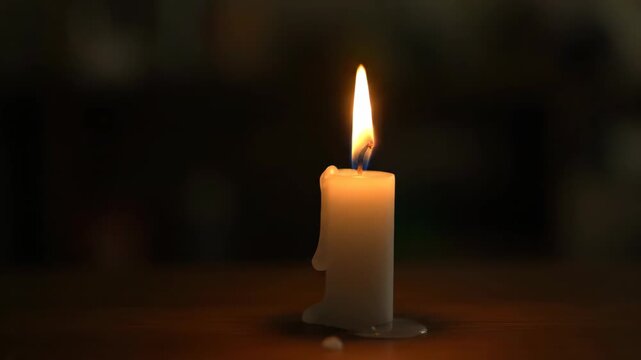 Burning candle close-up material, burning white candle