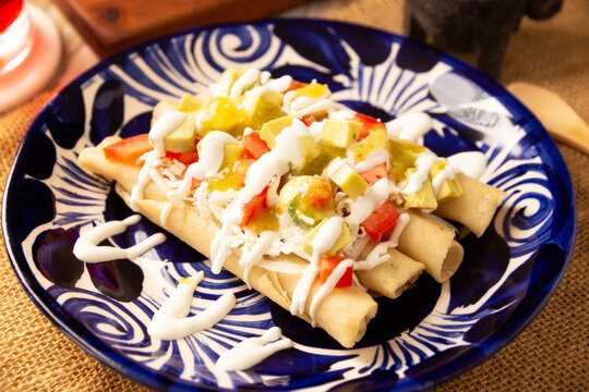 Tacos Dorados. Mexican dish also known as Flautas, consists of a rolled corn tortilla with some filling, commonly chicken or beef or vegetarian options such as potatoes.