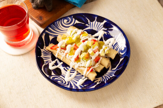 Tacos Dorados. Mexican dish also known as Flautas, consists of a rolled corn tortilla with some filling, commonly chicken or beef or vegetarian options such as potatoes.