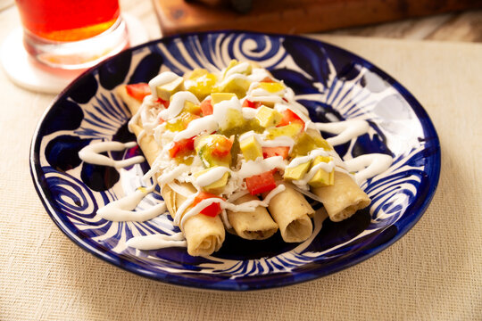 Tacos Dorados. Mexican dish also known as Flautas, consists of a rolled corn tortilla with some filling, commonly chicken or beef or vegetarian options such as potatoes.