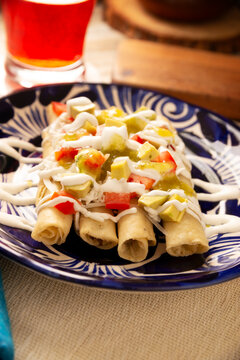Tacos Dorados. Mexican dish also known as Flautas, consists of a rolled corn tortilla with some filling, commonly chicken or beef or vegetarian options such as potatoes.