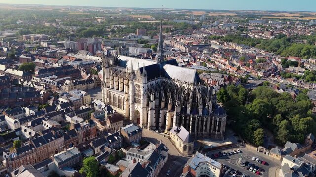 Amiens Cathedral is a 13th-century High Gothic UNESCO World Heritage site in France, renowned for its massive interior volume, soaring spire, and intricate flying buttresses dominating the city.