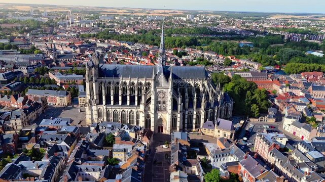 Amiens Cathedral is a 13th-century High Gothic UNESCO World Heritage site in France, renowned for its massive interior volume, soaring spire, and intricate flying buttresses dominating the city.