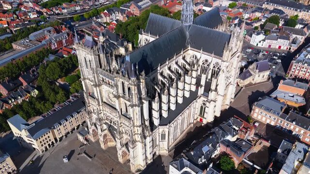 Amiens Cathedral is a 13th-century High Gothic UNESCO World Heritage site in France, renowned for its massive interior volume, soaring spire, and intricate flying buttresses dominating the city.