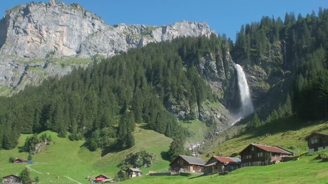 Staubenfall Waterfall in Isenthal Valley, Uri, Switzerland. Staeubenfall Waterfall in Swiss Alps.