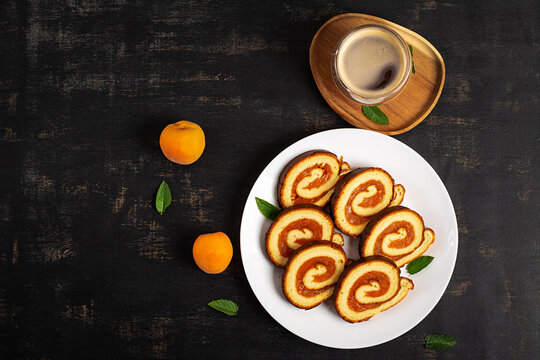 Artisan Swiss Roll Cake with Fruit Filling Overhead View