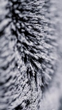 Metal Powder in Magnetic Field. Macro view of metallic particles forming sharp textured ridges under magnetic force. Ideal for science backgrounds.