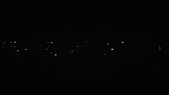 VHS tracking distortion and digital glitch artifact overlay on black