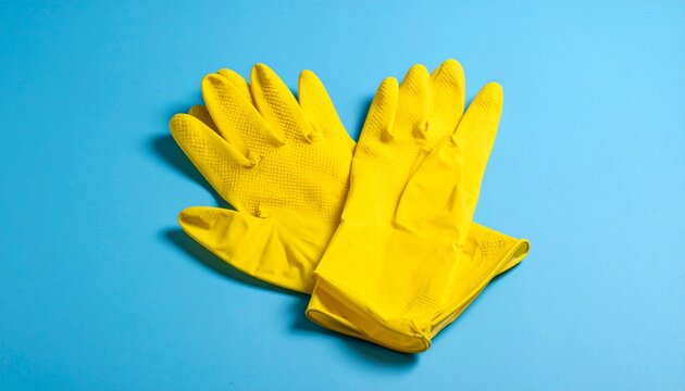 Yellow rubber gloves on blue background, symbolizing protection, cleanliness, discipline, resilience, utility, identity, balance, tradition, safety, culture, clarity.