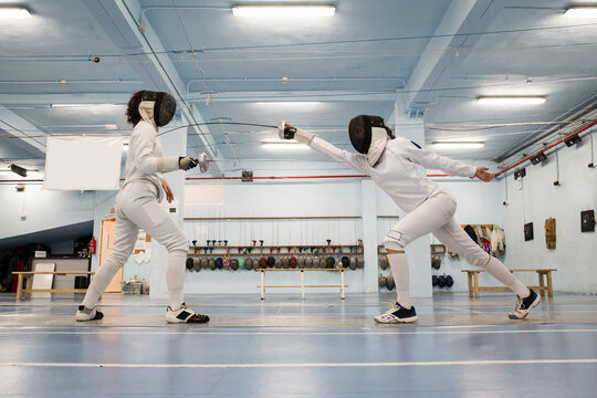 Female fencers during a fencing match