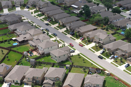 USA, Texas, San Antonio, Aerial view of suburban homes in summer