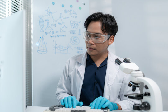 Scientists perform laboratory research using microscopes, test tubes, and modern scientific equipment to analyze samples, representing biotechnology, healthcare, diagnostics, and medical innovation.