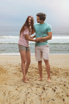 Young couple having fun on beach