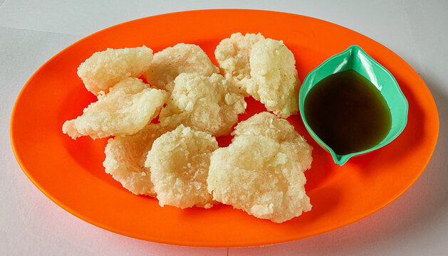 Crispy Cireng with Rujak Sauce on Orange Plate, Indonesian Street Food Snack