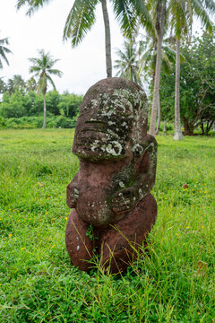 Ancient tiki statue near Coral Garden Beach on Huahine, French Polynesia