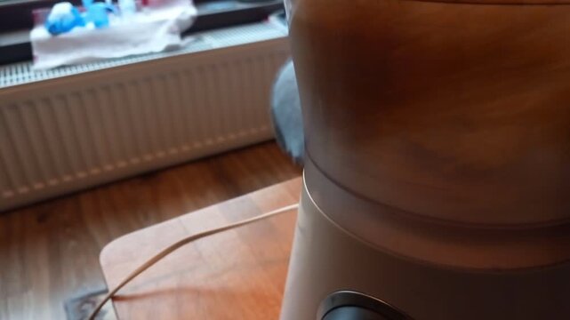 Food processor suddenly halts while chopping spaghetti close up of blade mechanism in action