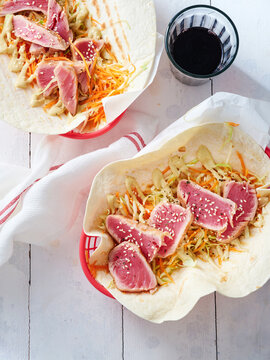 Tuna wraps with cabbage and carrot slaw, casual dining concept for summer menus