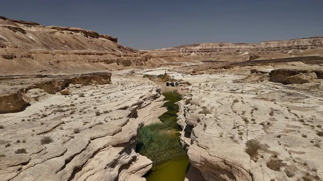 Aerial Drone Flyover Above Off-Road Vehicles in Nahal Pratzim Canyon, Israel
