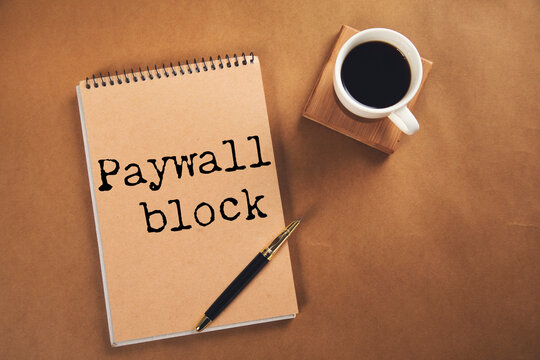 Paywall block text printed on  ripped paper