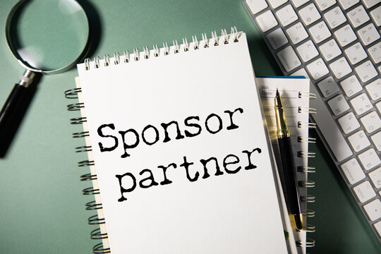 white paper sign with sponsor partner message