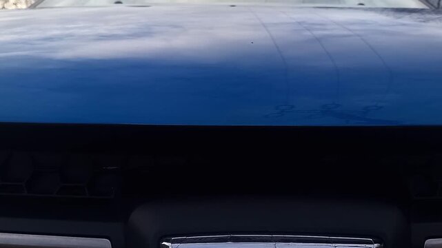 Car Front Hood Metallic Latch Release Click -- Close-up on Bonnet During Unlocking