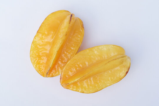 Two Ripe Starfruit Isolated on White Background for Healthy Food Concepts
