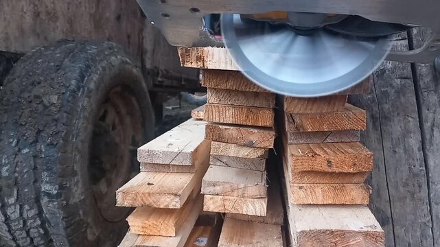 Cordless Circular Saw Cutting Wood Planks with Blade Acceleration Whine and Timber Sawing Groans -- Close-up on Saw Blade During Multiple Cuts