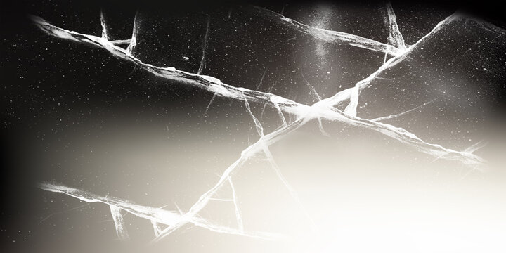 Abstract texture of shattered glass with glowing light leak on black background shattered fracture abstract