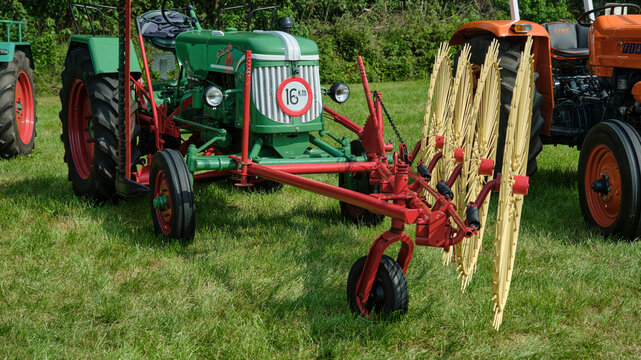Agricultural heritage and vintage farm machinery, Guldner tractor with front hay turner at Oldtimerdag in Ruinerwold, Netherlands
