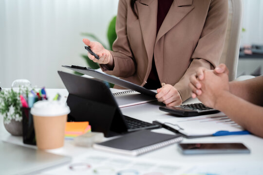Business administrator analyzing company marketing and sales performance to boost business growth in office environment