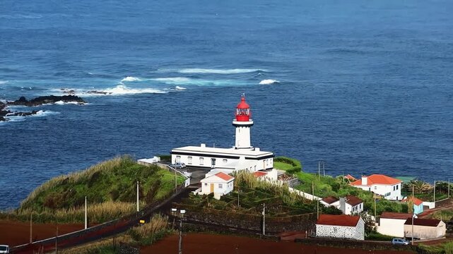 Farol Da Ponta Do Topo Lighthouse distant view in Sao Jorge Azores Portugal