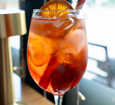Aperol spritz cocktail closeup, summer orange alcohol drink in glass