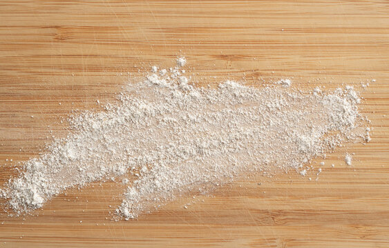 Wheat flour powder textured background, spelt grain dust pattern
