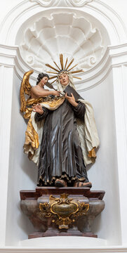 Salzburg -  The carved polychrome baroque statue of St. Therese of Avila in the church Kollegienkirche by Josef Anton Pfaffinger (1719&ndash;1720).