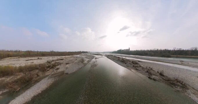 Captivating 360-degree aerial panorama showcasing a beautiful river flowing through a natural landscape in Rivalta.