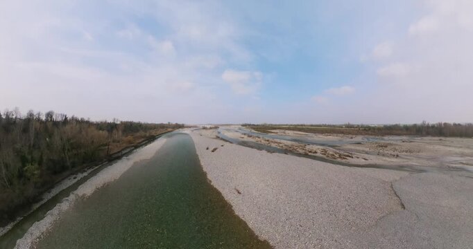 Immersive 360-degree aerial panorama capturing the serene Rivalta river and its vast natural surroundings.