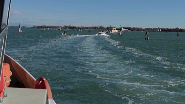 Slow Motion Boat Wake Through Coastal Water Canal