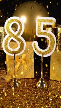 Gold Number 85 with Gold Glitter Confetti Sparkles with Gifts and Balloons for Party Eighty Five 4k Vertical