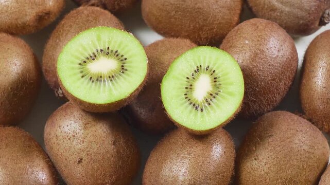Fresh Kiwifruit Halves and Whole Kiwi Fruits Rotating Showcase