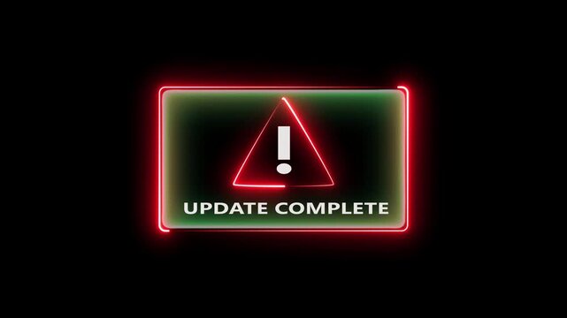 Digital alert warning screen with update complete text and neon glow.