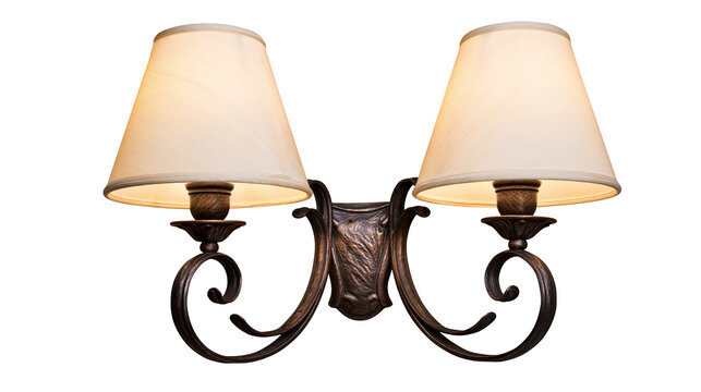 Ornate bronze double sconce with cream fabric shades, isolated on transparent background