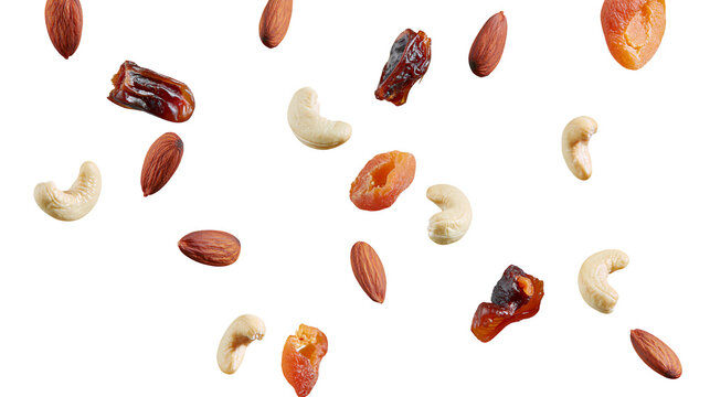 Assorted dried fruits and nuts including dates apricots almonds and cashews, isolated on transparent background