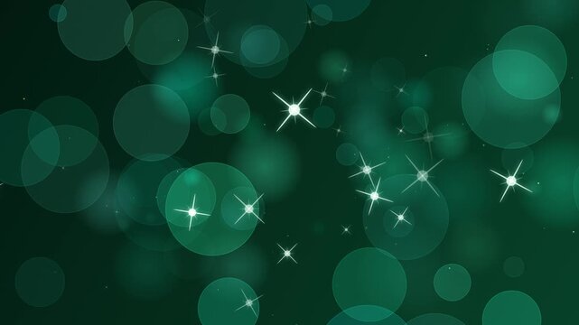 Abstract dark emerald green background with glowing bokeh and starlight particles. This elegant magical seamless motion graphic loop is perfect for nature and festive luxury backdrops.