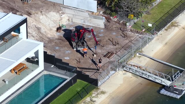 Aerial View of Waterfront Construction Site and Foundation Drilling in Surfers Paradise