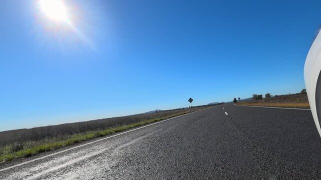 Driving Along a Rural Asphalt Highway in the Australian Outback