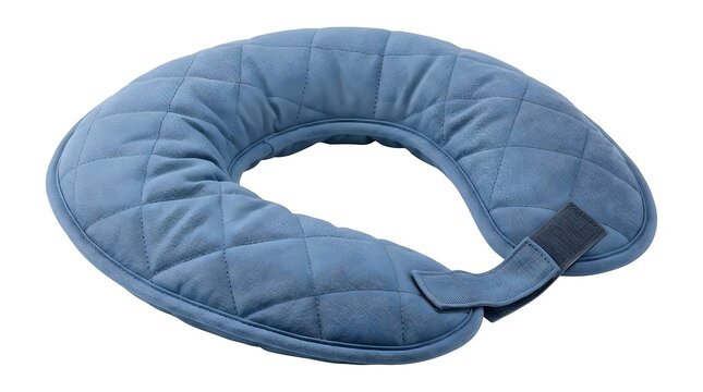 A blue neck pillow sits ready for use. It is designed to support the neck while traveling or resting. This pillow is useful for long journeys or nap times in different settings