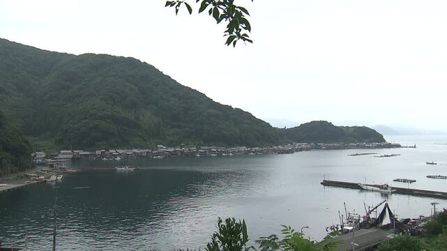 Footage zooming in on Ine Bay from an overhead view of Ine Town, Kyoto Prefecture.
