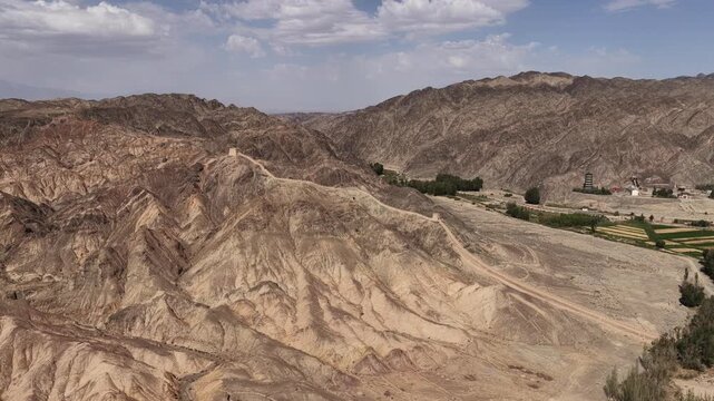 Ancient Chinese Great Wall Watchtower and Fortification on Rugged Mountains in Gansu Province, Northwest China
